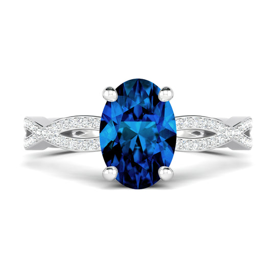 Bague de fiançailles avec saphir bleu ovale et anneau tressé