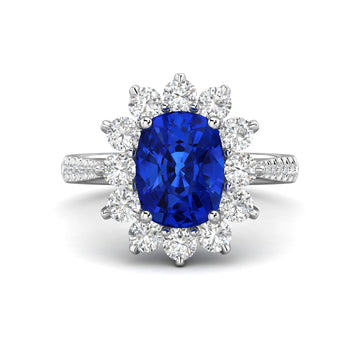 Vintage oval blue sappphire with diamond halo engagement ring